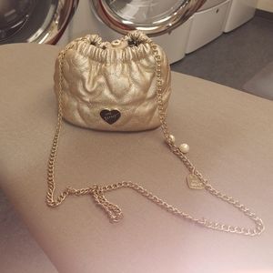 Cute! Gold Betsey Johnson faux leather quilted, cross body shoulder hand bag.